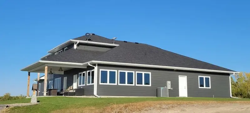 Grey ranch-style home in Omaha, Nebraska after a roof replacement