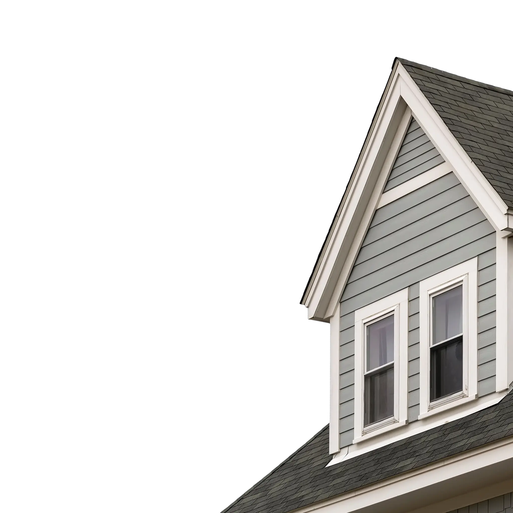 Grey roof and dormer against a blue sky